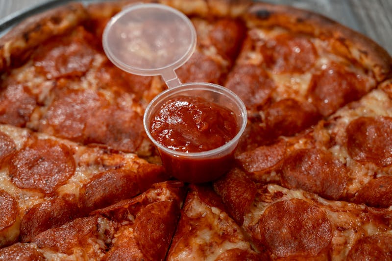 Spicy Buffalo Ranch pizza with hot sauce drizzle