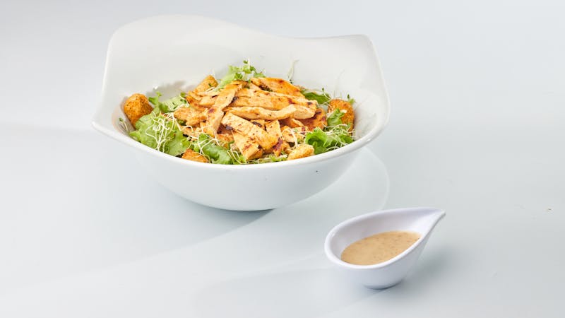 Fresh Caesar salad with croutons and parmesan