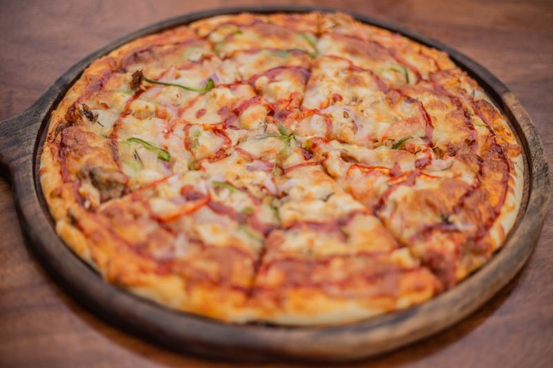 Harvest Ranch pizza with seasonal vegetables